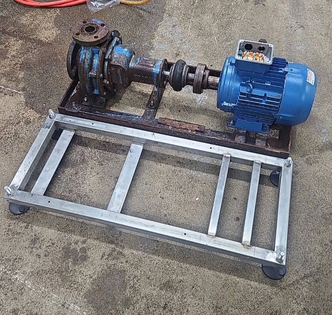 Pump and blue motor mounted on a new galvanised steel frame